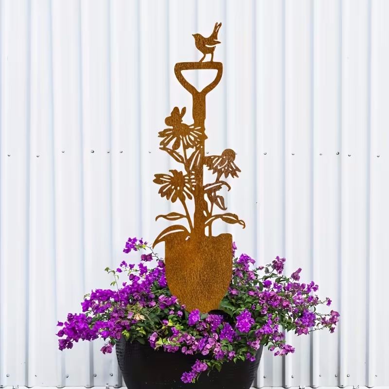 Schaufel mit Vogel Erdspieß